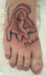 Lion King "Hakuna Matata" tattoo on foot