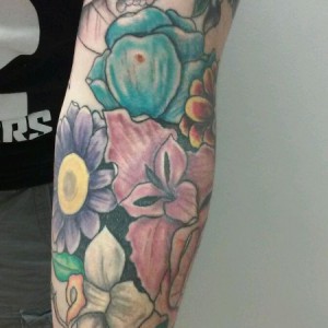 Floral sleeve tattoo