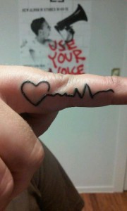Finger Heart Beat Tattoo