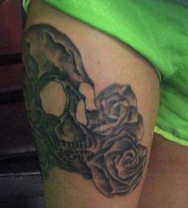 Greyscale skull thigh piece, from front